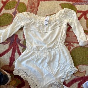 White Rumor plays it size small new with tags. Adorable on who can pull it off!